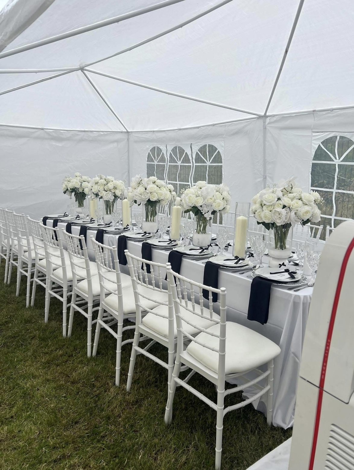 Wedding interior with navy chiavari chairs